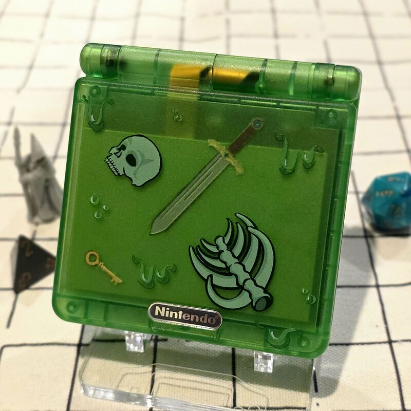 Gelatinous Boy Advance SP — open, transparent green shell with glow-in-the-dark buttons and IPS screen