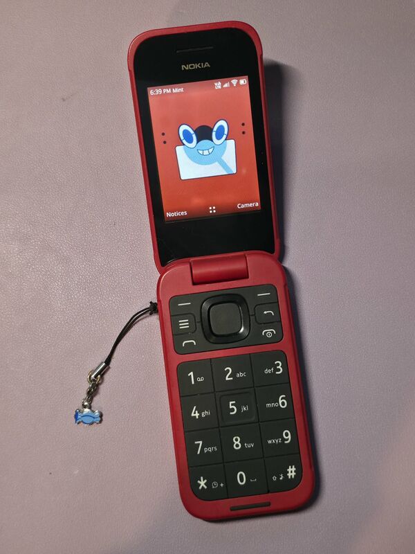 Pokia Rotom Flip 2780 — red Nokia flip phone open with Rotom wallpaper